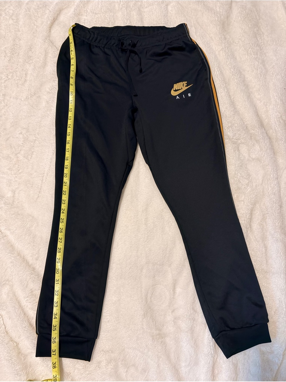Nike Men’s Black Joggers with Gold Trim